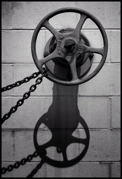 industrial-water-valve-on-commercial-building-in-black-and-white_t20_pL1p6N (1)